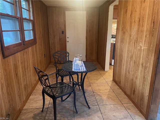 203 Windsor Ave, Smithfield, VA 23430 - dining space featuring wood walls, baseboards, and light tile patterned floors