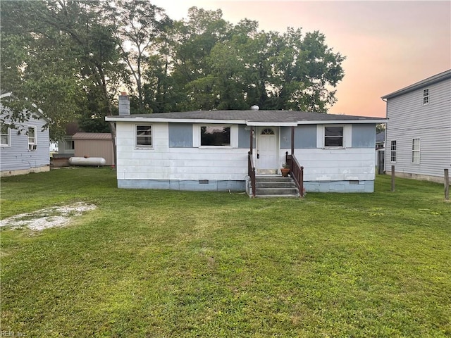 203 Windsor Ave, Smithfield, VA 23430 - view of front facade featuring crawl space, entry steps, a yard, and a chimney