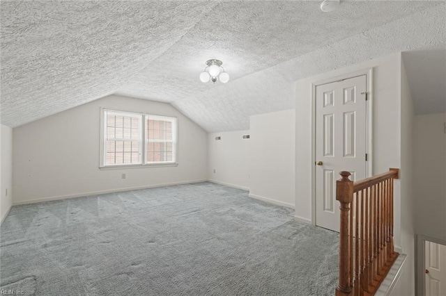 1118 Patrick Ln, Newport News, VA 23608 - bonus room with a textured ceiling, carpet, and vaulted ceiling