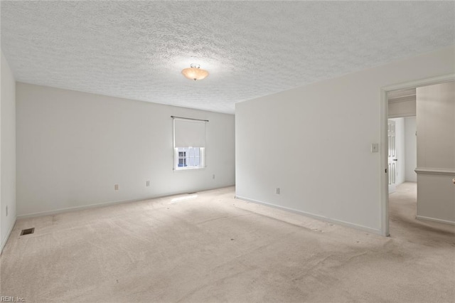 1118 Patrick Ln, Newport News, VA 23608 - carpeted spare room featuring a textured ceiling