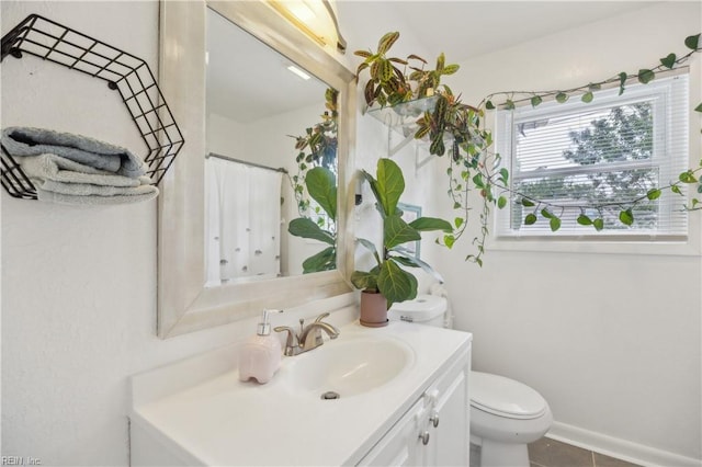 1014 Rowe St, Hampton, VA 23669 - full bathroom with vanity, toilet, and a shower with curtain
