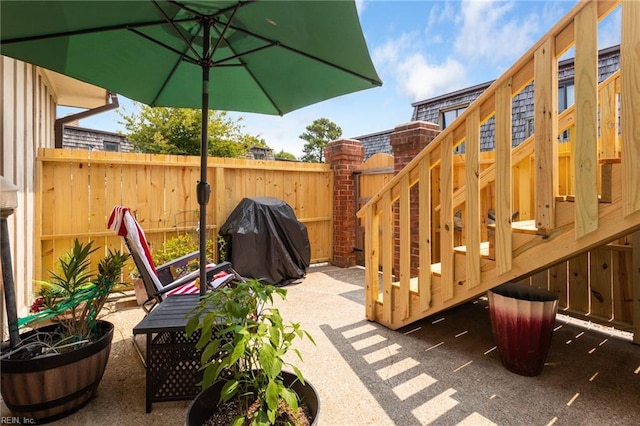 1107 Ocean Pebbles Way, Virginia Beach, VA 23451 - view of patio / terrace with a grill, a deck, and stairway