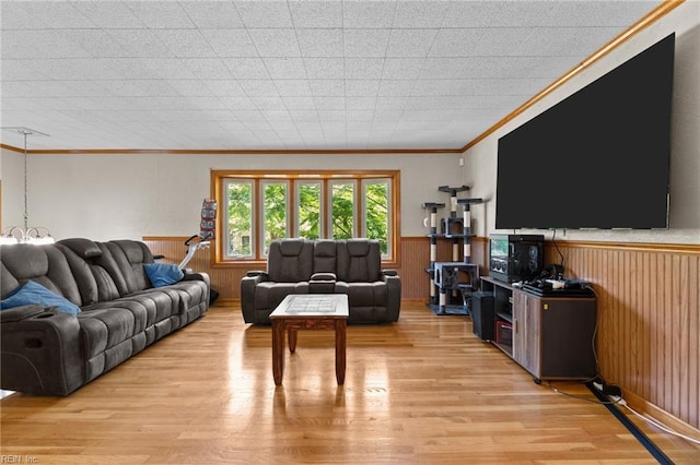 119 Waltham St, Hampton, VA 23666 - living room with light wood-style flooring, wainscoting, ornamental molding, and wood walls