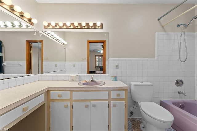 119 Waltham St, Hampton, VA 23666 - full bath with vanity, toilet, tile walls, bathing tub / shower combination, and a wainscoted wall