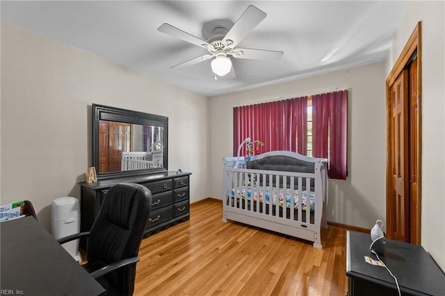 119 Waltham St, Hampton, VA 23666 - bedroom with wood finished floors, a desk, a closet, baseboards, and a ceiling fan