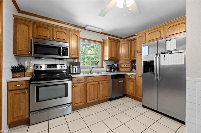 119 Waltham St, Hampton, VA 23666 - kitchen with appliances with stainless steel finishes, brown cabinets, and light countertops