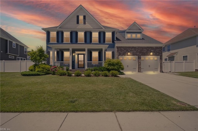 2209 Beeblossom Ln, Chesapeake, VA 23323 - view of front facade with concrete driveway, covered porch, and a garage