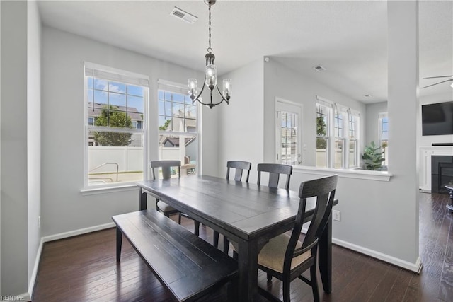 2209 Beeblossom Ln, Chesapeake, VA 23323 - dining area featuring baseboards, dark wood-style flooring, and a chandelier