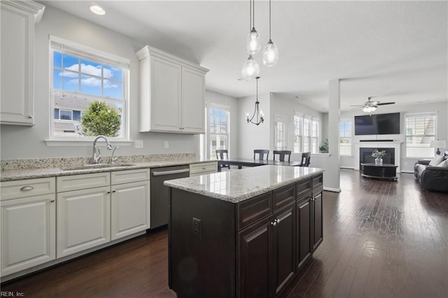 2209 Beeblossom Ln, Chesapeake, VA 23323 - kitchen featuring dishwasher, a sink, white cabinetry, healthy amount of natural light, and recessed lighting