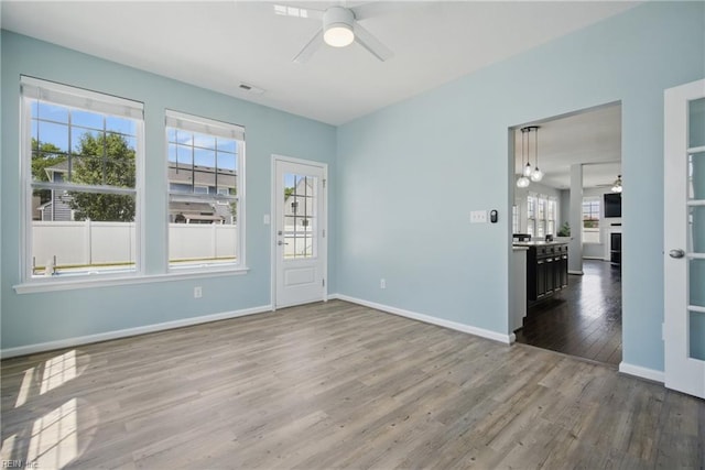 2209 Beeblossom Ln, Chesapeake, VA 23323 - foyer with ceiling fan, wood finished floors, and baseboards