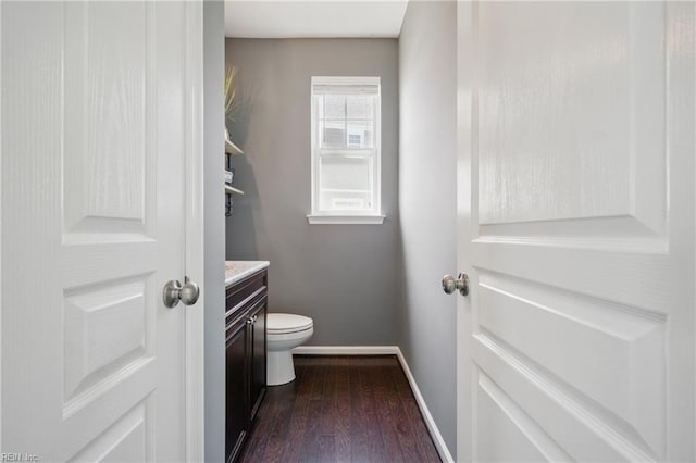 2209 Beeblossom Ln, Chesapeake, VA 23323 - bathroom featuring baseboards, wood finished floors, vanity, and toilet
