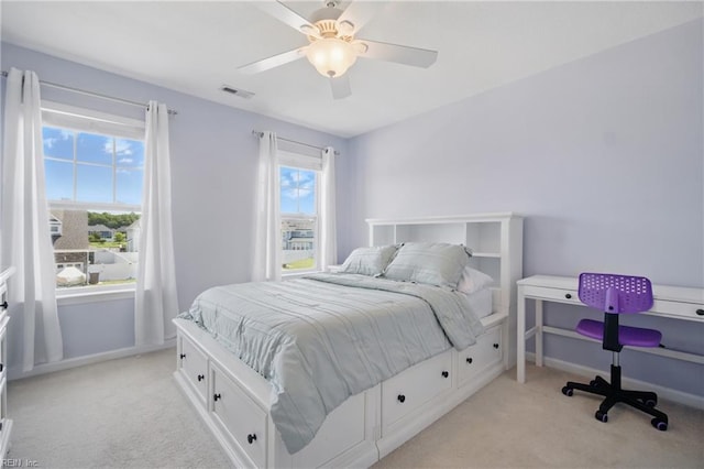 2209 Beeblossom Ln, Chesapeake, VA 23323 - bedroom featuring light carpet, baseboards, and a ceiling fan