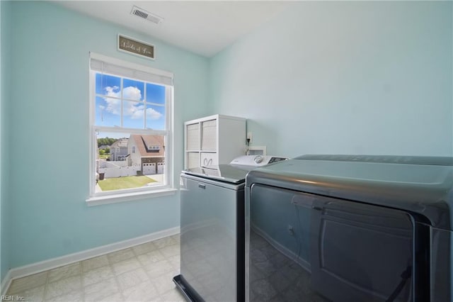 2209 Beeblossom Ln, Chesapeake, VA 23323 - washroom with separate washer and dryer, baseboards, a desk, and tile patterned floors