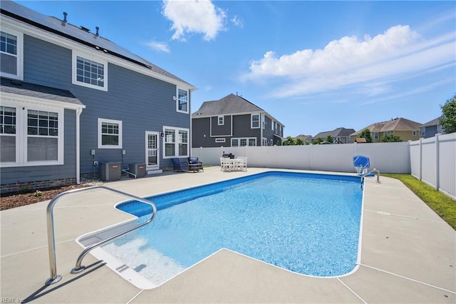 2209 Beeblossom Ln, Chesapeake, VA 23323 - view of swimming pool with entry steps, a patio area, a fenced backyard, and central AC unit