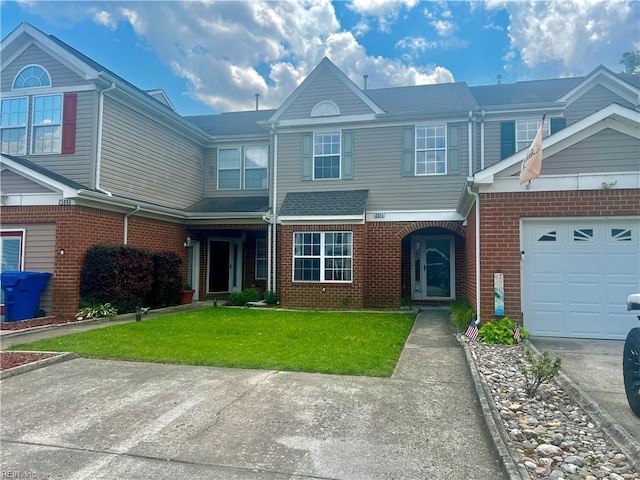 2511 Hartley St, Virginia Beach, VA 23456 - view of property with brick siding, a front lawn, and driveway