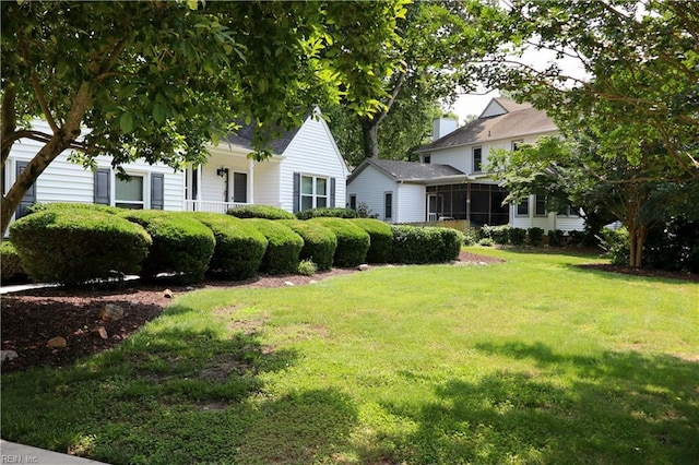1314 Hunningdon Woods Blvd, Chesapeake, VA 23320 - view of green lawn with a sunroom