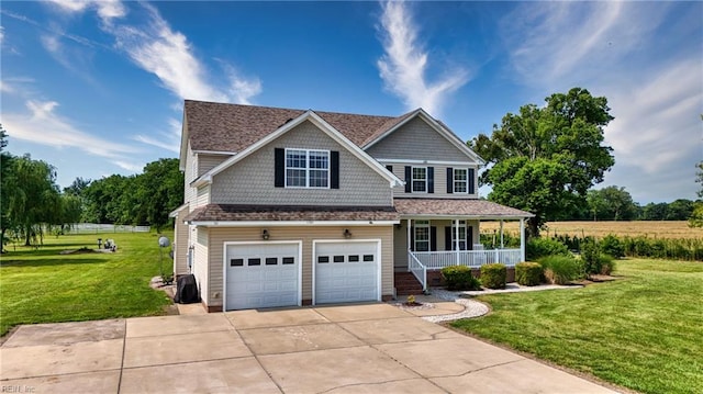 1701 Sanderson Rd, Chesapeake, VA 23322 - view of front of house with a porch, driveway, a front lawn, and an attached garage