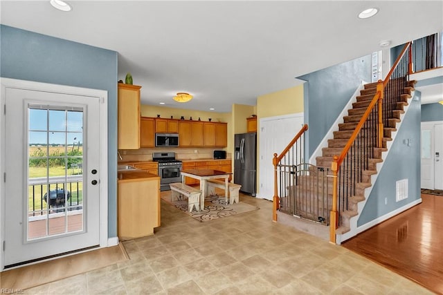 1701 Sanderson Rd, Chesapeake, VA 23322 - kitchen with stainless steel appliances, a sink, baseboards, light countertops, and recessed lighting