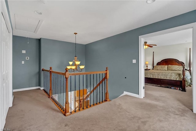 1701 Sanderson Rd, Chesapeake, VA 23322 - hallway with attic access, carpet, an upstairs landing, and baseboards