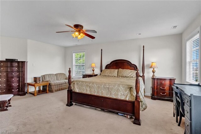 1701 Sanderson Rd, Chesapeake, VA 23322 - carpeted bedroom featuring multiple windows and a ceiling fan