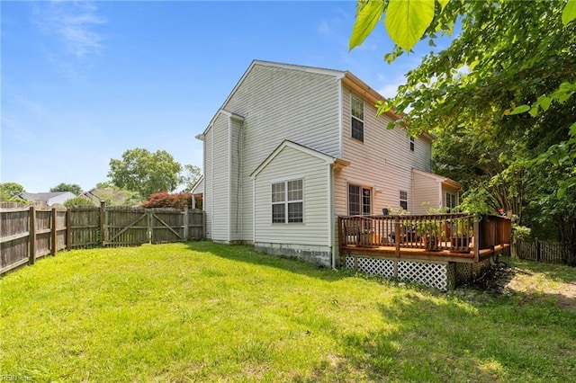 520 Kemp Lndg, Suffolk, VA 23434 - rear view of house featuring a wooden deck and a fenced backyard