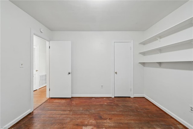 404 Forest Hill Cres, Suffolk, VA 23434 - unfurnished bedroom featuring wood finished floors and baseboards