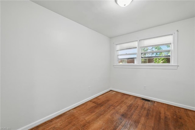 404 Forest Hill Cres, Suffolk, VA 23434 - empty room with baseboards and wood finished floors
