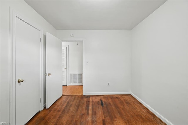 404 Forest Hill Cres, Suffolk, VA 23434 - unfurnished bedroom with wood finished floors and baseboards