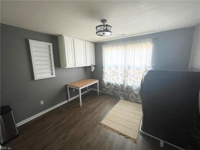 131 Hawks Nest Ln, Suffolk, VA 23435 - dining space featuring dark wood-type flooring and baseboards