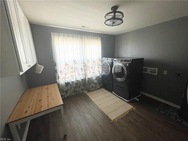 131 Hawks Nest Ln, Suffolk, VA 23435 - laundry room with washing machine and dryer, wood finished floors, cabinet space, and a chandelier