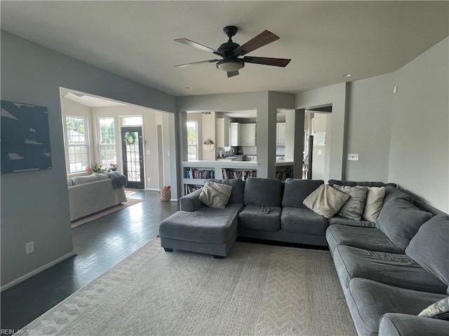 131 Hawks Nest Ln, Suffolk, VA 23435 - living area with ceiling fan, baseboards, and wood finished floors