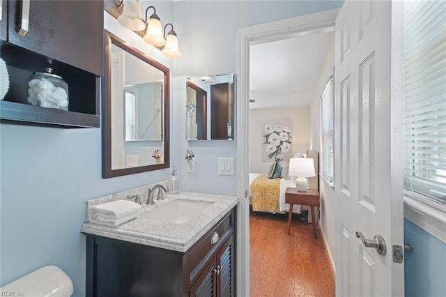 191 Compton Pl, Newport News, VA 23606 - bathroom featuring vanity, toilet, wood finished floors, and ensuite bathroom