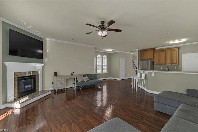 7556 Villa Ct, Gloucester, VA 23061 - living area featuring ornamental molding, dark wood finished floors, a ceiling fan, baseboards, and a fireplace