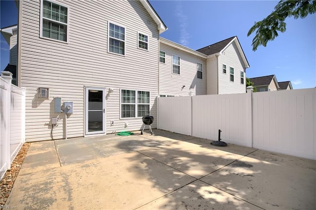 7556 Villa Ct, Gloucester, VA 23061 - rear view of property featuring a patio