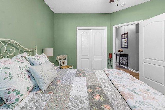 3101 Bridgewater Dr, Carrollton, VA 23314 - bedroom featuring a ceiling fan, a closet, wood finished floors, and baseboards