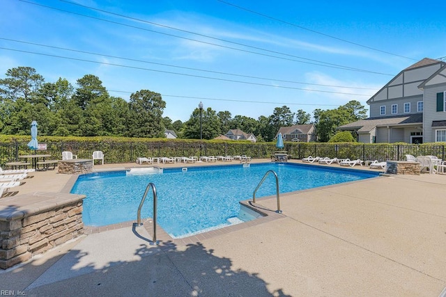 3101 Bridgewater Dr, Carrollton, VA 23314 - community pool featuring a patio