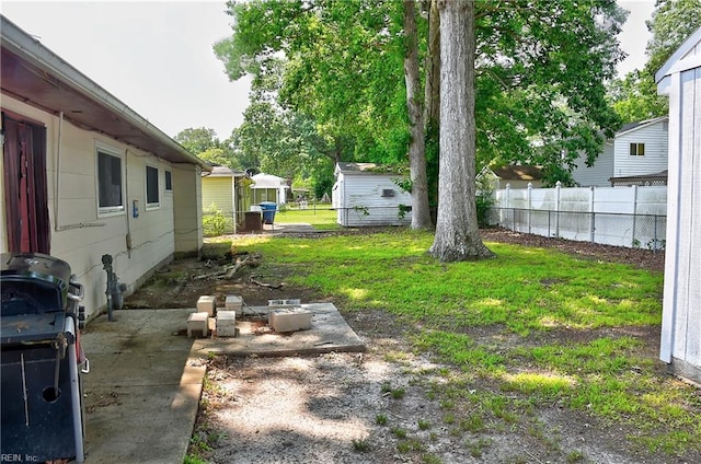 409 Barcelona Ln, Virginia Beach, VA 23452 - view of yard with a patio area and an outbuilding