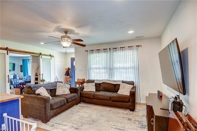 409 Barcelona Ln, Virginia Beach, VA 23452 - living area with a barn door, a ceiling fan, and recessed lighting