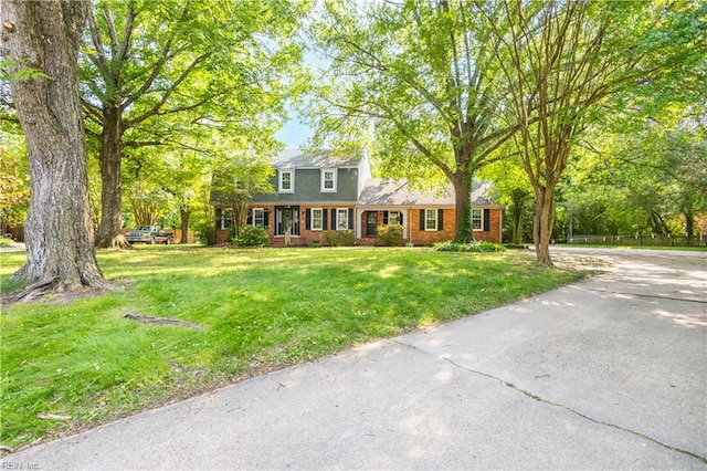 613 S Claypool Ct, Virginia Beach, VA 23464 - view of front of home featuring brick siding and a front lawn