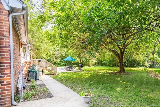 613 S Claypool Ct, Virginia Beach, VA 23464 - view of grassy yard with a patio area
