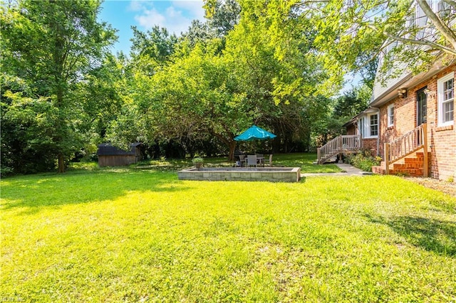 613 S Claypool Ct, Virginia Beach, VA 23464 - view of grassy yard with a patio area