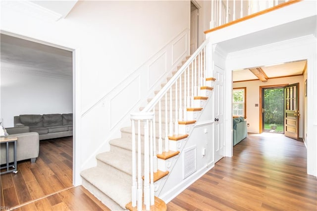 613 S Claypool Ct, Virginia Beach, VA 23464 - staircase featuring crown molding and wood finished floors