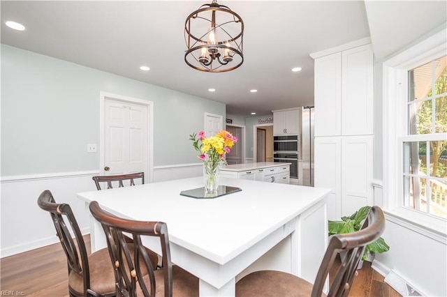 613 S Claypool Ct, Virginia Beach, VA 23464 - dining area featuring dark wood-style floors, a chandelier, recessed lighting, and baseboards