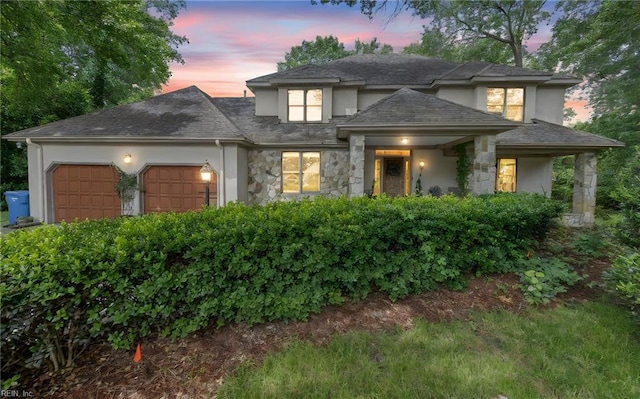 1001 Fairway Ct, Chesapeake, VA 23320 - view of front of home featuring stone siding, stucco siding, and a garage