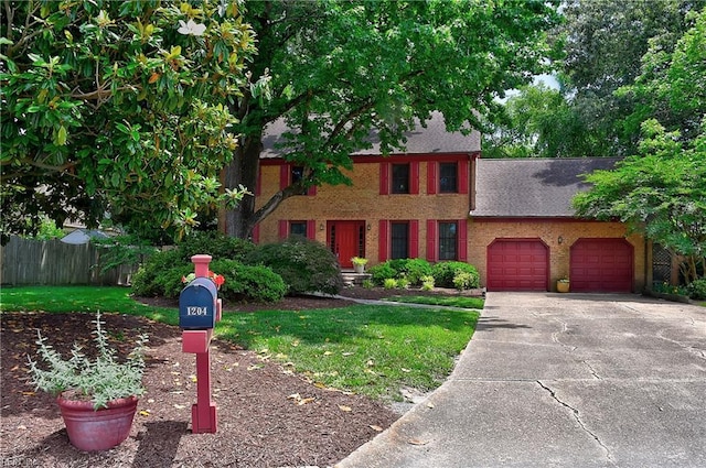 1204 Merrifield Lndg, Virginia Beach, VA 23464 - view of front of house featuring a garage, brick siding, concrete driveway, and a shingled roof