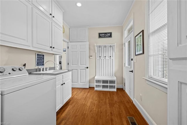 200 Congress Ave, Hampton, VA 23669 - laundry area with washer / dryer, cabinet space, wood finished floors, baseboards, and recessed lighting