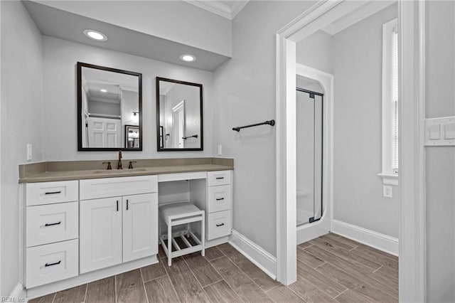 200 Congress Ave, Hampton, VA 23669 - bathroom with vanity, baseboards, a shower stall, ornamental molding, and wood finish floors