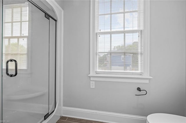 200 Congress Ave, Hampton, VA 23669 - full bathroom with baseboards, a stall shower, and toilet