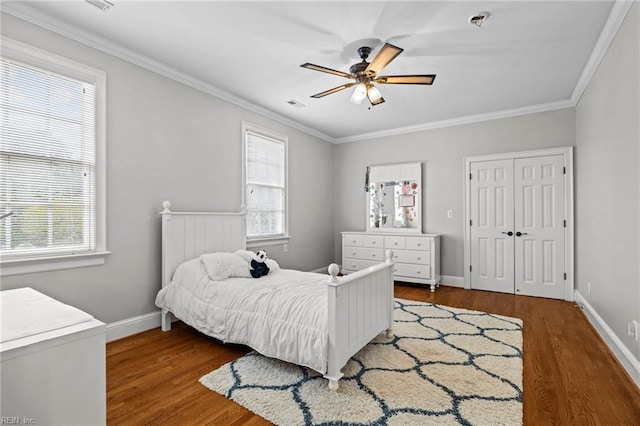 200 Congress Ave, Hampton, VA 23669 - bedroom featuring wood finished floors, ornamental molding, baseboards, ceiling fan, and a closet