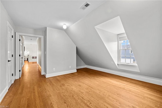 200 Congress Ave, Hampton, VA 23669 - bonus room featuring light wood-type flooring, lofted ceiling, baseboards, and attic access